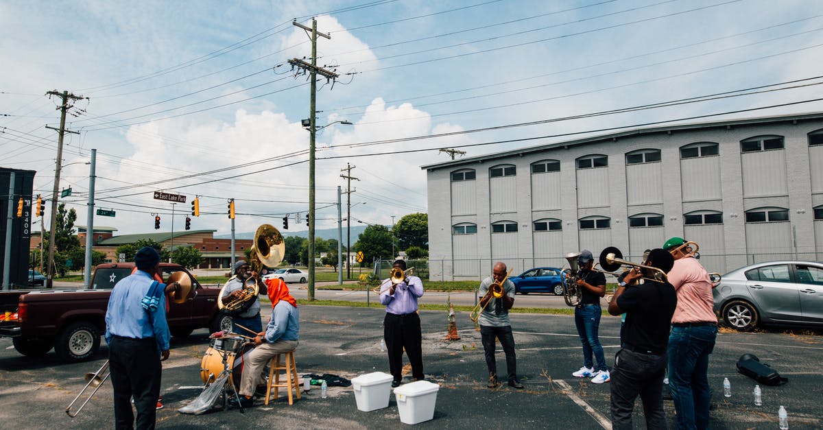 How to play Team Sonic Racing in local coop mode using single joycon - Black men playing instruments in town
