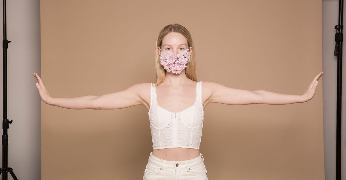 How to prevent camera Y axis to invert when inside a vehicle? - Woman with spread arms in flower mask