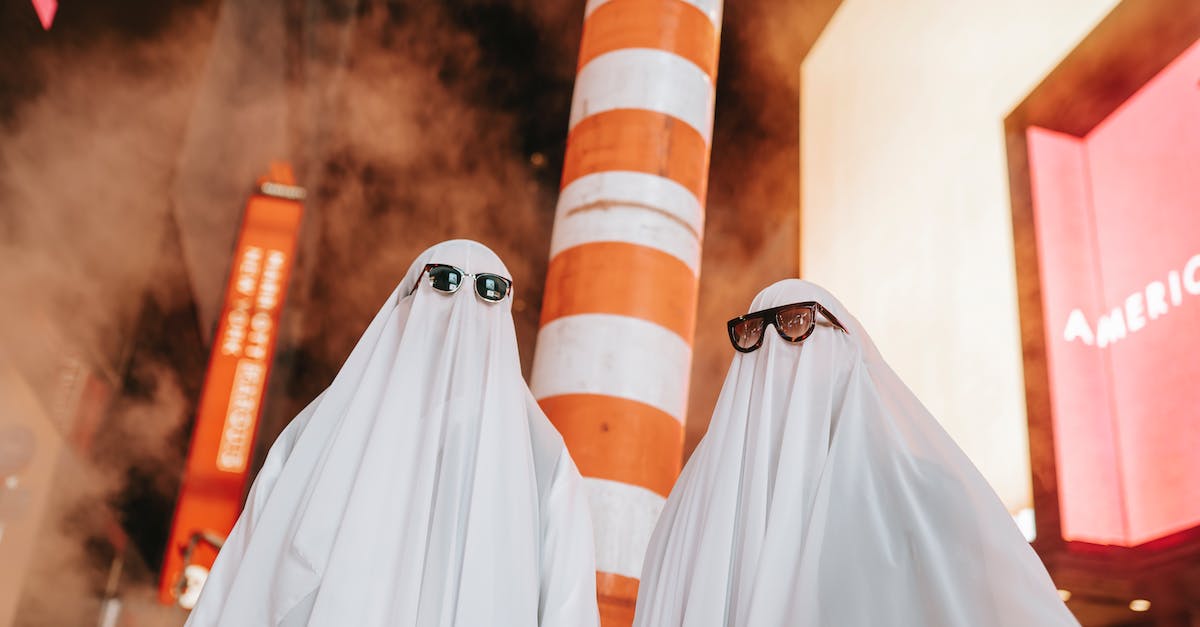 How to prevent my Steam from messing with my outside audio? - Unrecognizable couple in ghost costumes on night street with buildings How to prevent my Steam from messing with my outside audio? - Unrecognizable couple in ghost costumes on night street with buildings