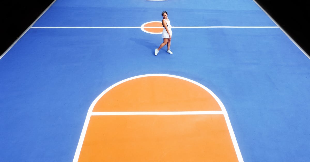 How to prevent the closest player from breaking blocks? - Young sportsman standing on sports court How to prevent the closest player from breaking blocks? - Young sportsman standing on sports court