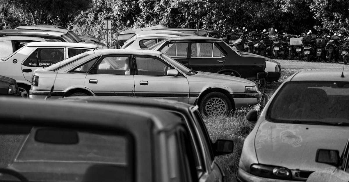 How to profit on vehicles - Grayscale Photo of Cars Parked on Parking Lot
