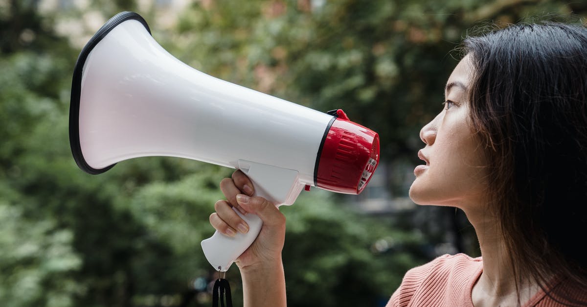 How to pronounce "Pate" for the megaphone? - Woman Holding a Megaphone