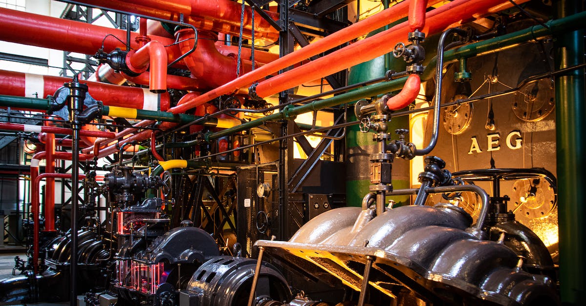 How to pump mercury into Industrial Grinder? - Gray and Red Industrial Machine