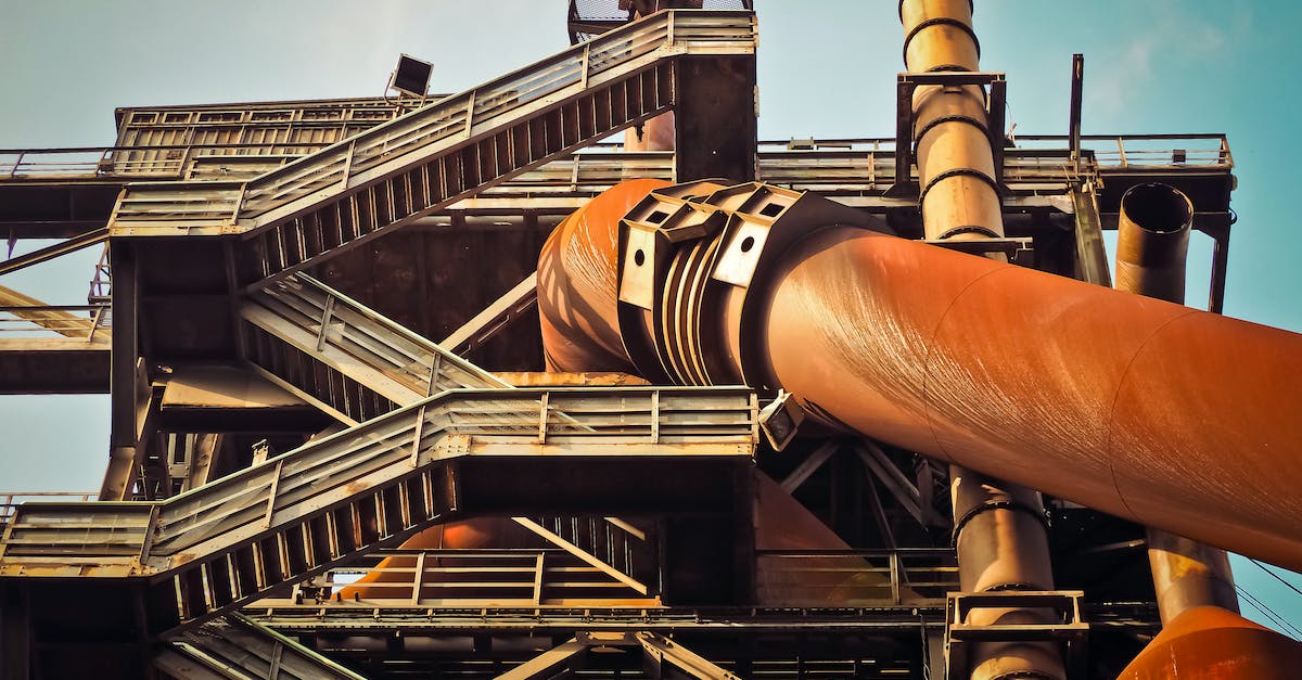How to pump mercury into Industrial Grinder? - Brown and Gay Industrial Machine during Daytme How to pump mercury into Industrial Grinder? - Brown and Gay Industrial Machine during Daytme
