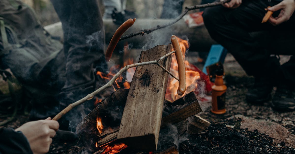 How to quickly select Necronomicon Archer to use mana burn - Selective Focus Photography of People Holding Sticks With Sausages How to quickly select Necronomicon Archer to use mana burn - Selective Focus Photography of People Holding Sticks With Sausages