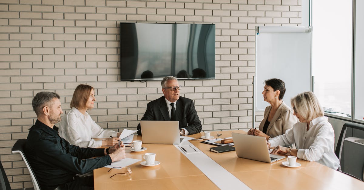 How to reapply for work permit? - 3 Women Sitting at the Table How to reapply for work permit? - 3 Women Sitting at the Table