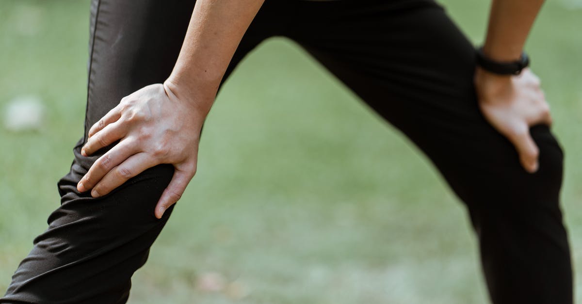How to recover a banned Runescape account? - Crop sportsperson resting after training on lawn