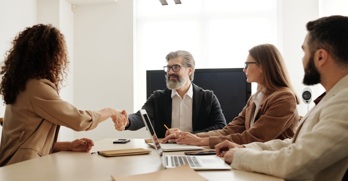 How to recruit people into the blades? - Man in Black Suit Jacket Sitting Beside Woman in Brown Long Sleeve Shirt