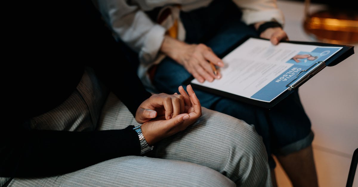 How to recruit people into the blades? - Person in White Long Sleeve Shirt Holding a Clipboard with Resume
