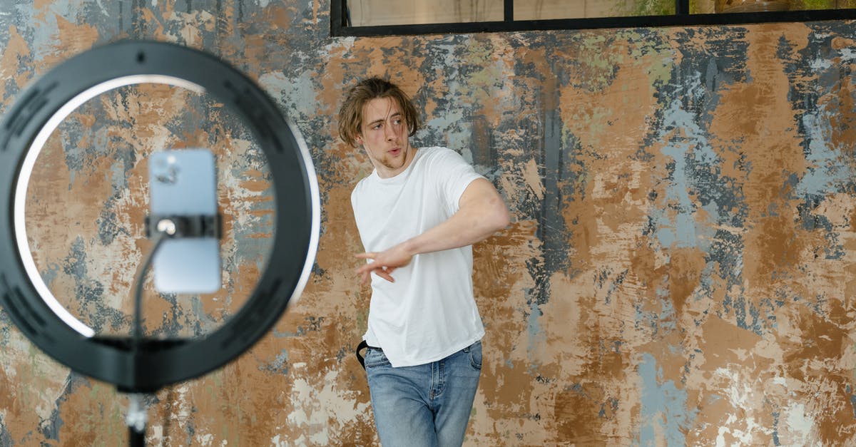 How to re-enable intro videos? - Man in White T-shirt and Blue Denim Jeans Standing Beside Brown and Black Wall How to re-enable intro videos? - Man in White T-shirt and Blue Denim Jeans Standing Beside Brown and Black Wall
