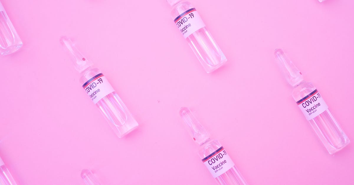 How to repeat glitch that turns med vendors into gun vendors? - Glass ampoules of COVID vaccine on pink surface