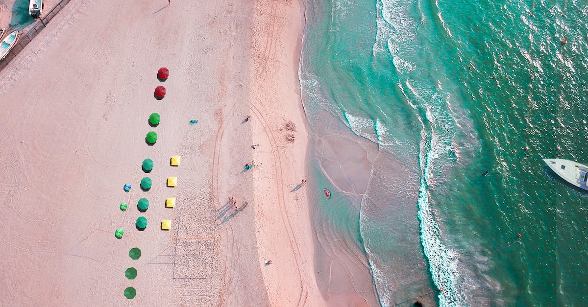 How to re-route save folder destination - Sandy seaside with colorful umbrellas to hold out on sun rays How to re-route save folder destination - Sandy seaside with colorful umbrellas to hold out on sun rays