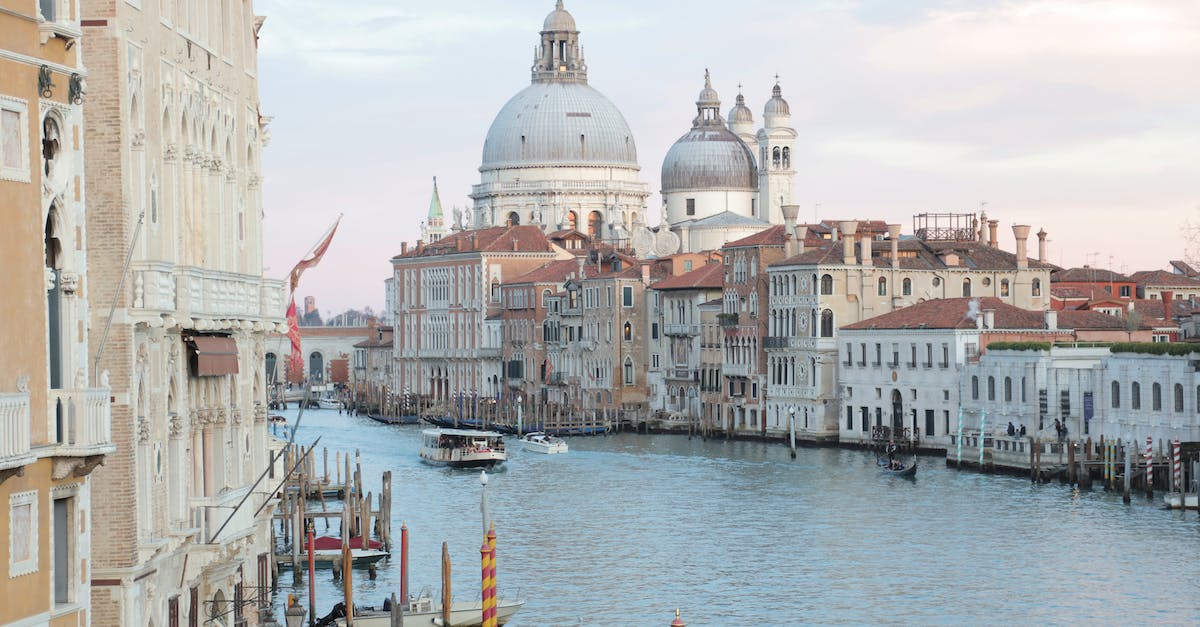 How to salute at team-match end? - View of grand canal and old cathedral of Santa Maria della Salute in Venice in Italy on early calm morning