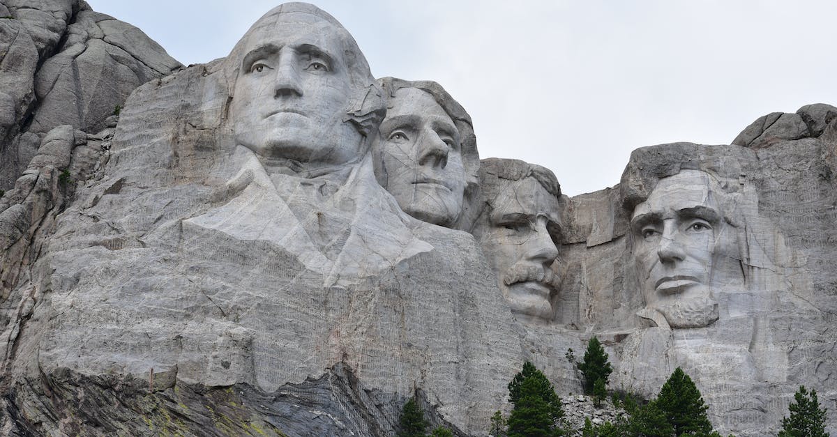 How to see difference between national and world wonders - Granite faces of famous politicians carved on mount