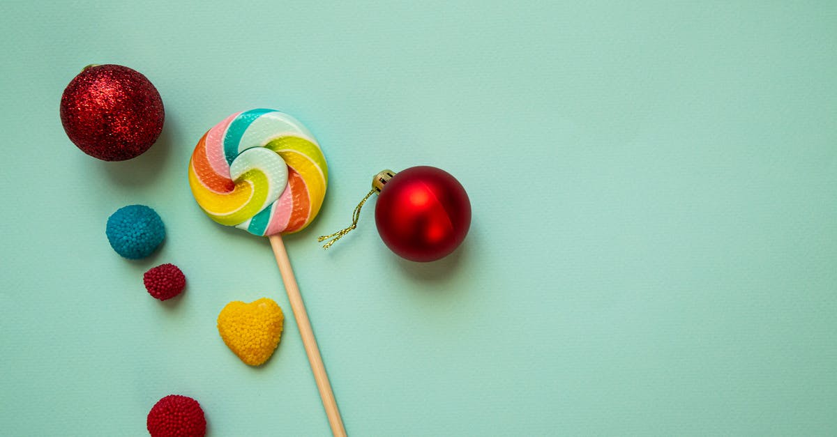 How to set a new baseline heart rate? - Sweet lollipop and Christmas ball composed on green surface How to set a new baseline heart rate? - Sweet lollipop and Christmas ball composed on green surface