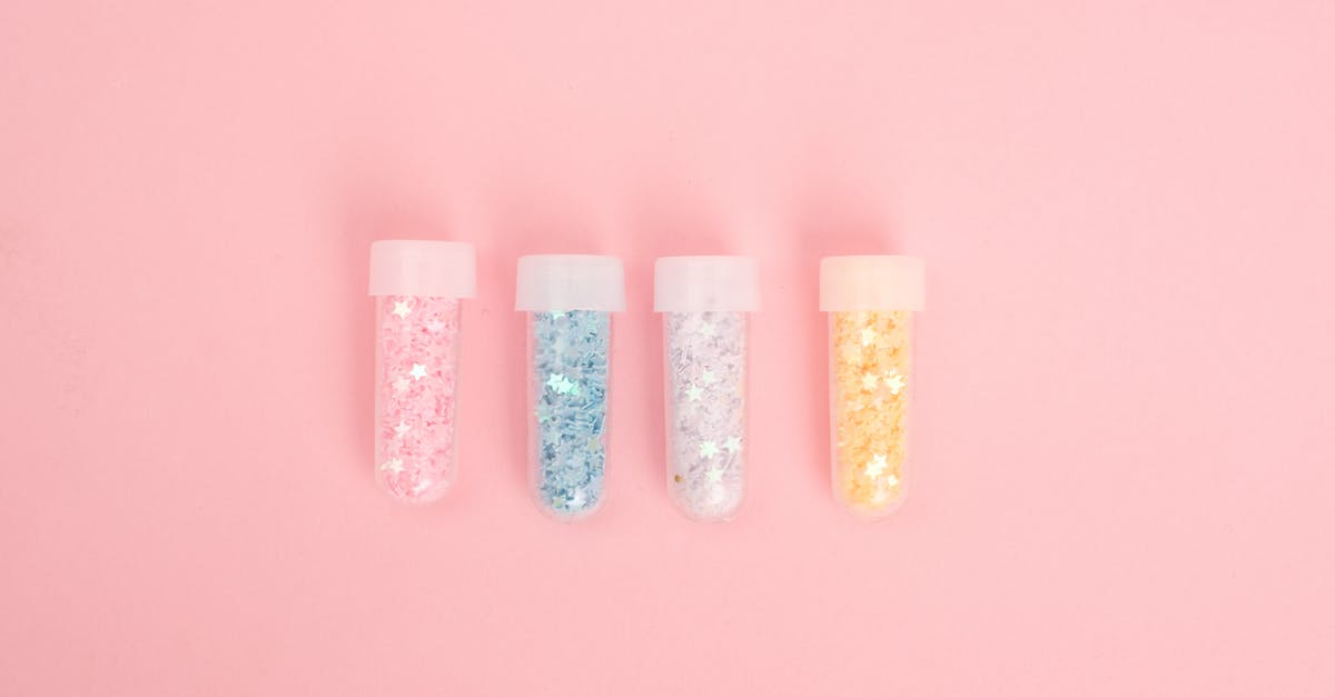 How to set Command Block(s) to test for a particular time and output a message? - High angle collection of various trial lenses and frame placed in red holder in ophthalmology clinic