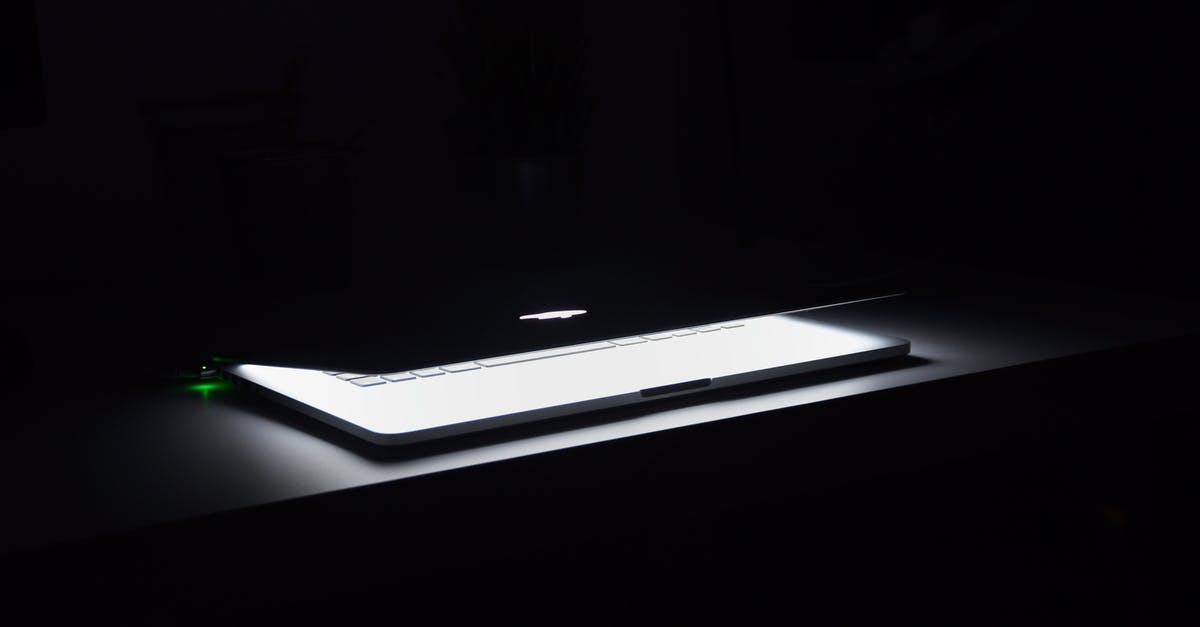 How to setup offline maps? - Photography of Macbook Half Opened on White Wooden Surface