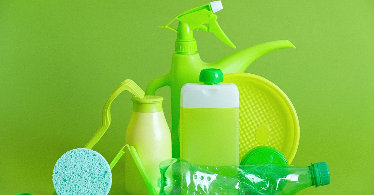 How to sort different output (like Plastic and Waste)? - Monochrome green bottles and containers for liquids or gel with plastic bottle and lids on green background