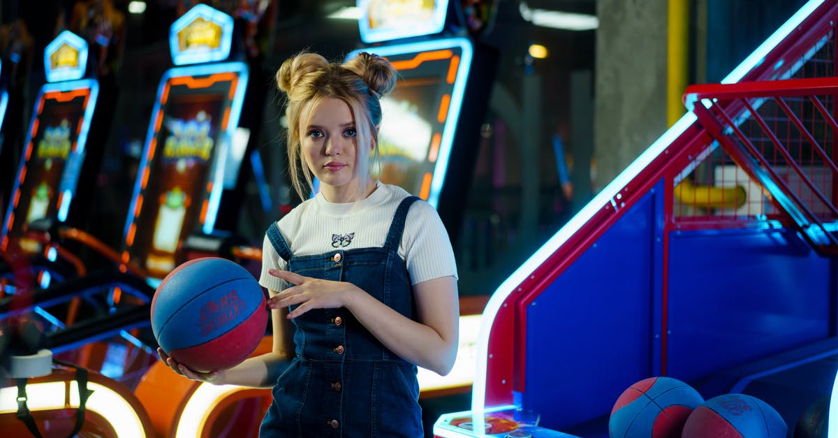 How to spectate an arcade game in dota 2? - A Woman Holding a Basketball