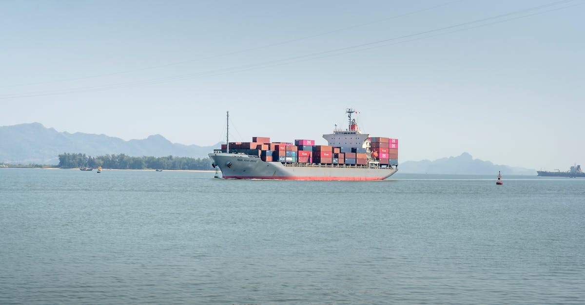 How to steal cargo? - Red and White Cargo Ship on Sea Under Blue Sky How to steal cargo? - Red and White Cargo Ship on Sea Under Blue Sky