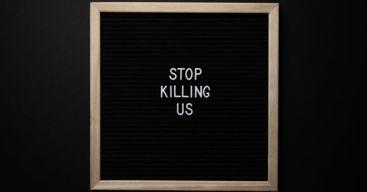 How to stop an infinite kill command loop in a realm server? [duplicate] - Top view of slogan Stop Killing Us on surface of square blackboard on black background
