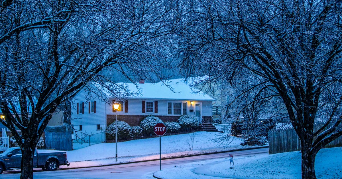 How to stop quests from auto failing in Fallout4 due to time restriction? - Dwelling house near snowy road and leafless trees in winter