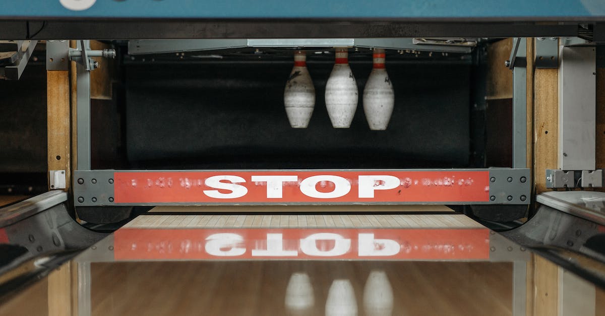 How to stop some games blowing fuse - Photo of Bowling Pins Near a Stop Sign