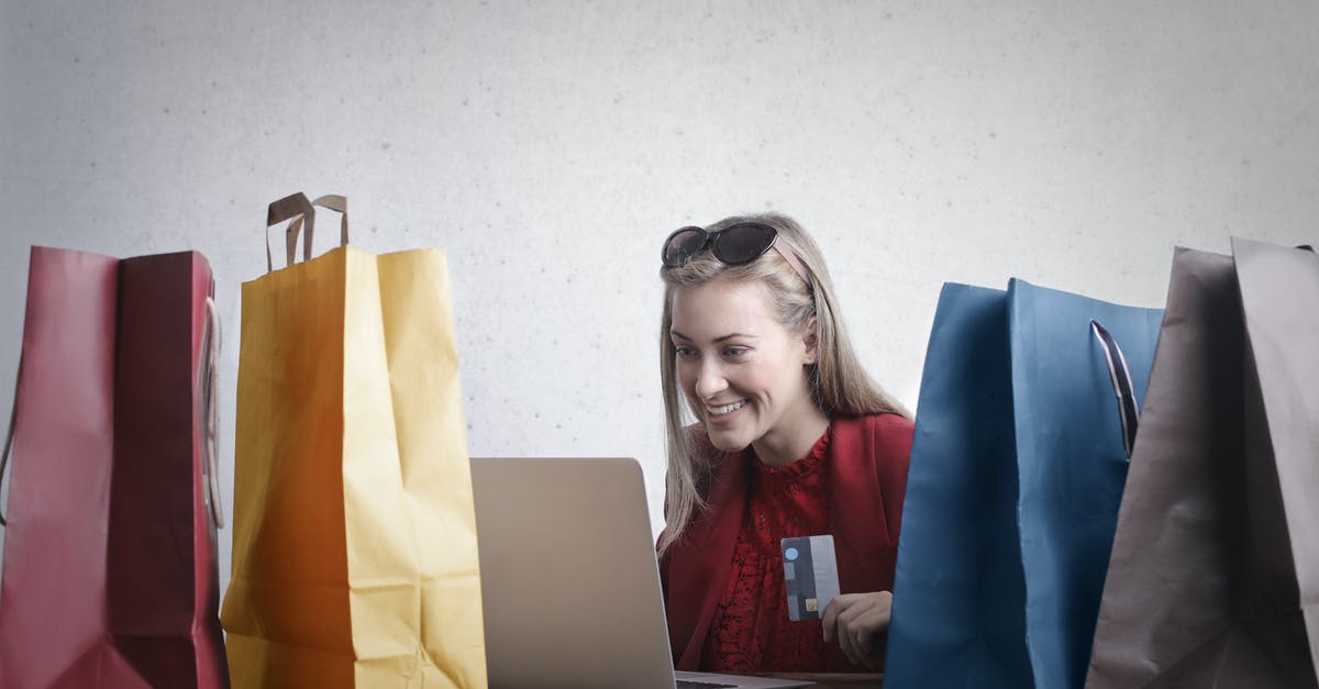 How to successfully cross a river without using money - Happy woman shopping online at home