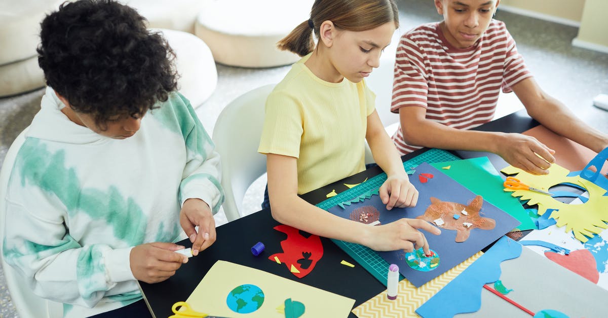 How to summon an invisible crafting table? - Group of Student Doing Their Projects Together