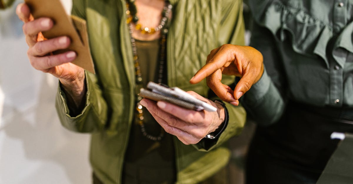 How to swap a specific weapon for a new weapon during a supply drop in MGSV: TPP - Man in Green Button Up Shirt Holding Silver Smartphone