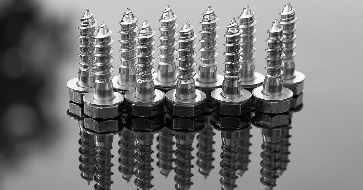 How to switch multi-tool modes and reload the Bolt Caster? - Selective Focus Photography of Silver Screws