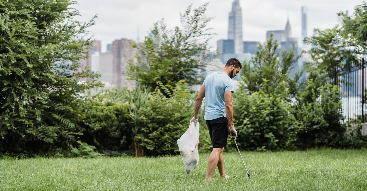 How to take away only one of multiple items [duplicate] - Free stock photo of back to camera, bag, black man