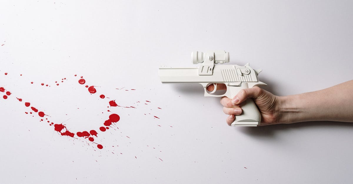 How to tell if a weapon is one or two-handed - Person Holding White Plastic Hair Comb