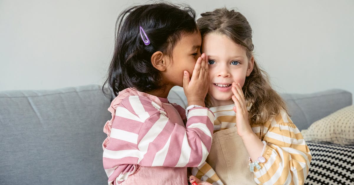 How To Tell If amiibo Is First-Run Or Reprint - Ethnic girl sitting on sofa close to smiling best friend and whispering secrets on ear How To Tell If amiibo Is First-Run Or Reprint - Ethnic girl sitting on sofa close to smiling best friend and whispering secrets on ear