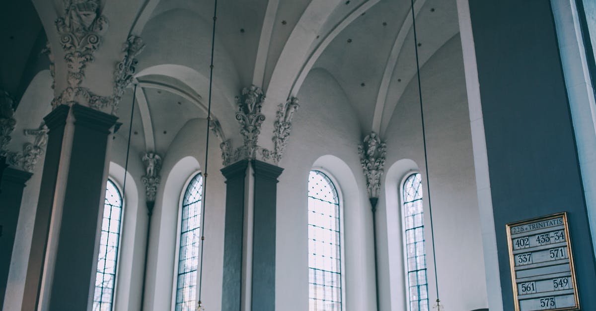 How to turn off the blue barrier below the Nali church in Bluff Eversmoking - Spacious hall of baroque catholic cathedral with arched windows