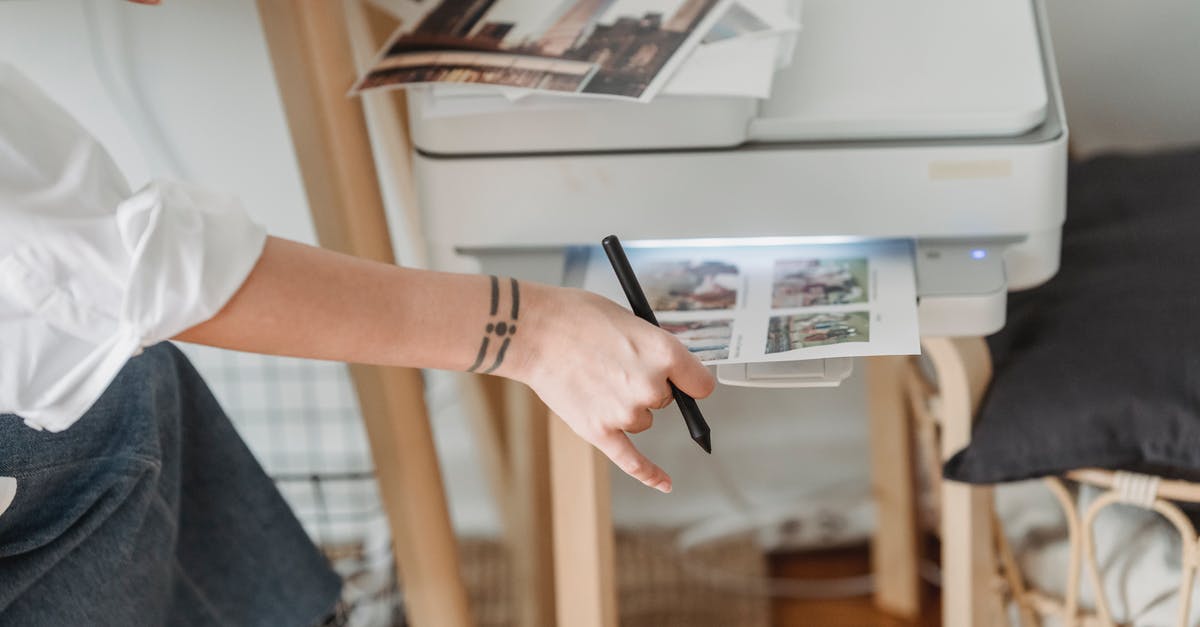 How to understand which creature is the best to be mimicked using Phantom Image or Create Illusion in Heroes IV? - Woman printing photos on paper while forking at home