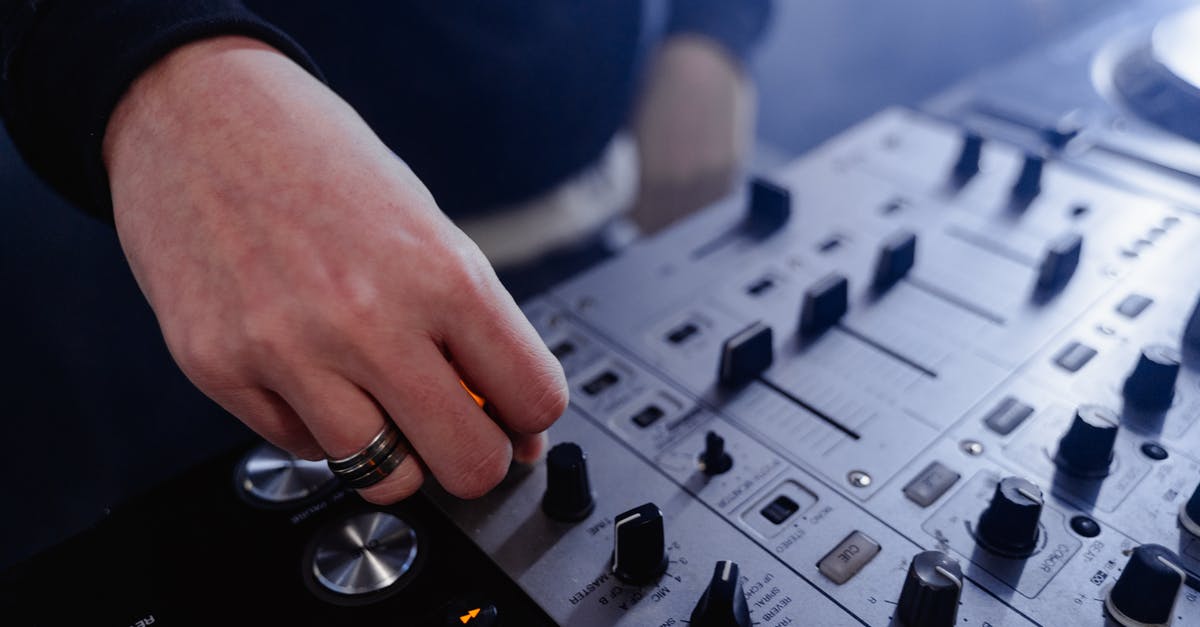 How to use azerty controls in infinifactory? - Close-Up Shot of a DJ Using a Mixing Console How to use azerty controls in infinifactory? - Close-Up Shot of a DJ Using a Mixing Console