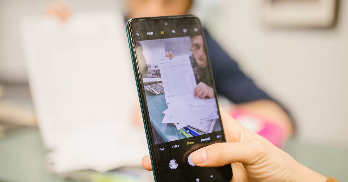 how to use IGI-4 cheats [closed] - Student Taking Photo of the Test Paper