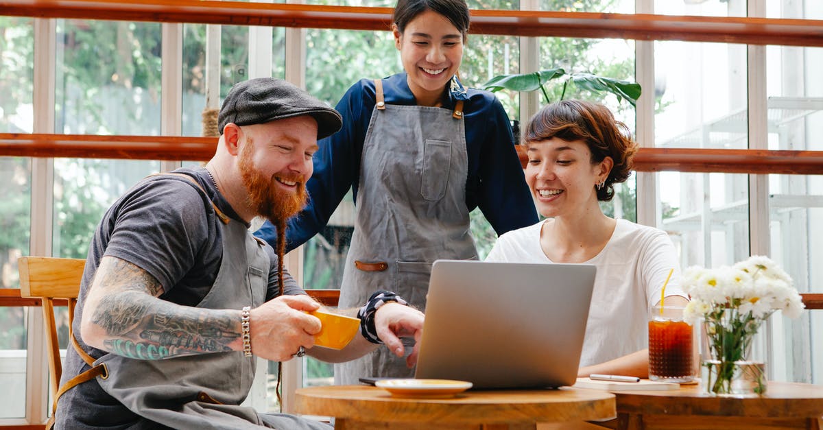 How to use multiple mics while streaming on twitch local - Positive coworkers in aprons and casual outfit using computer in cafeteria at table with coffee cup and glass of drink in day How to use multiple mics while streaming on twitch local - Positive coworkers in aprons and casual outfit using computer in cafeteria at table with coffee cup and glass of drink in day