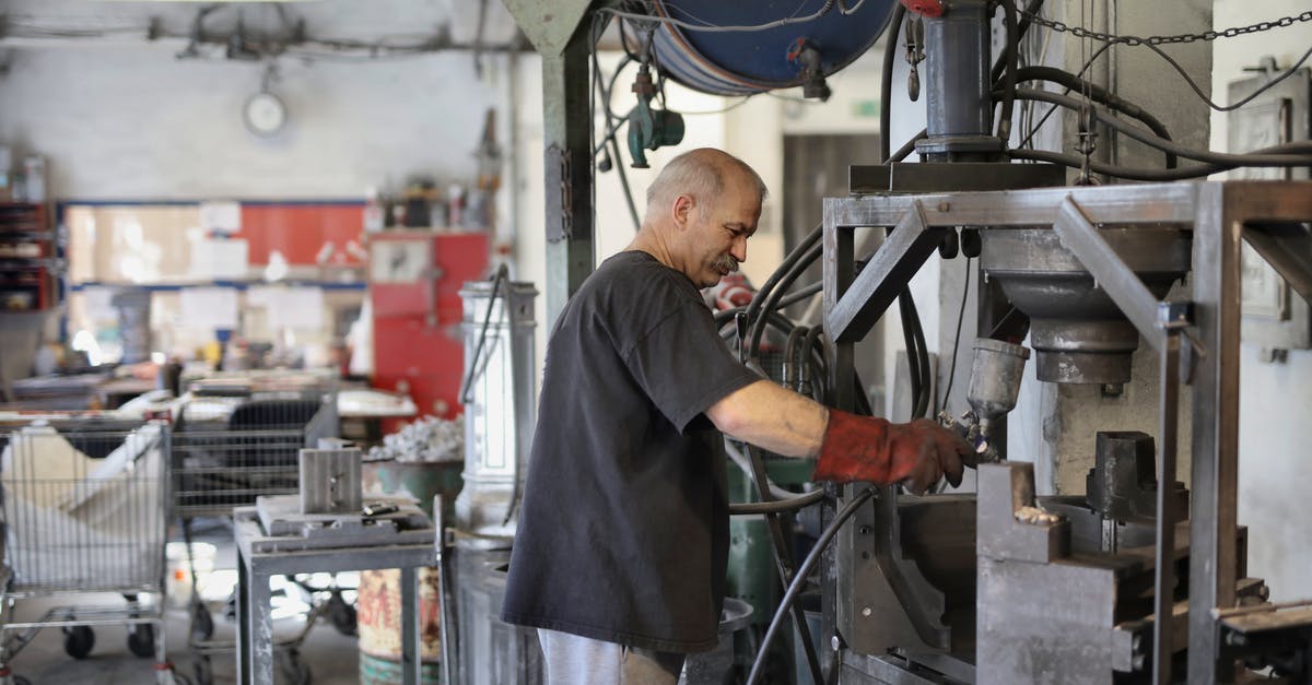 How to use Requisitions? - Elderly white hair worker using machine How to use Requisitions? - Elderly white hair worker using machine