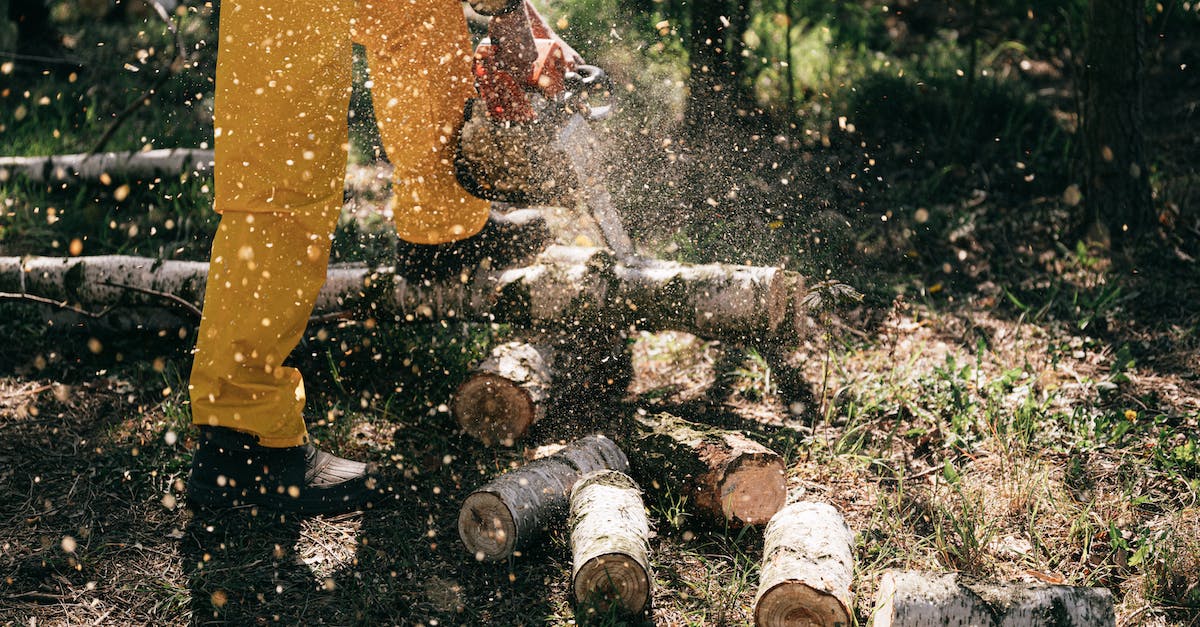 How to use the wire cutter tool? - Person in Yellow Pants and Brown Boots Using Chainsaw How to use the wire cutter tool? - Person in Yellow Pants and Brown Boots Using Chainsaw