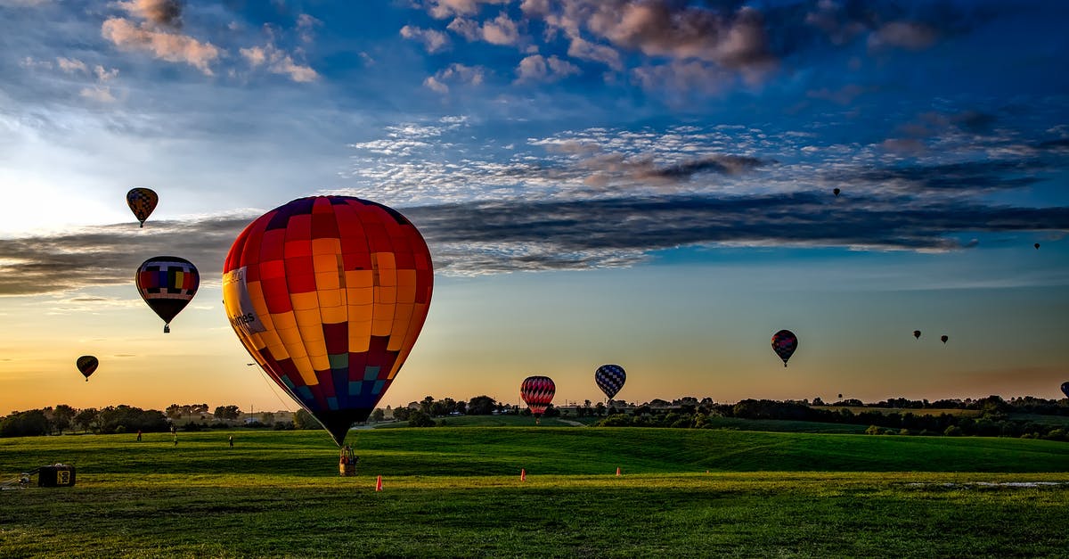 How to vertically take off in VTOL aircraft? - Assorted-color Hot Air Balloons on Grass Field during Golden Hour How to vertically take off in VTOL aircraft? - Assorted-color Hot Air Balloons on Grass Field during Golden Hour