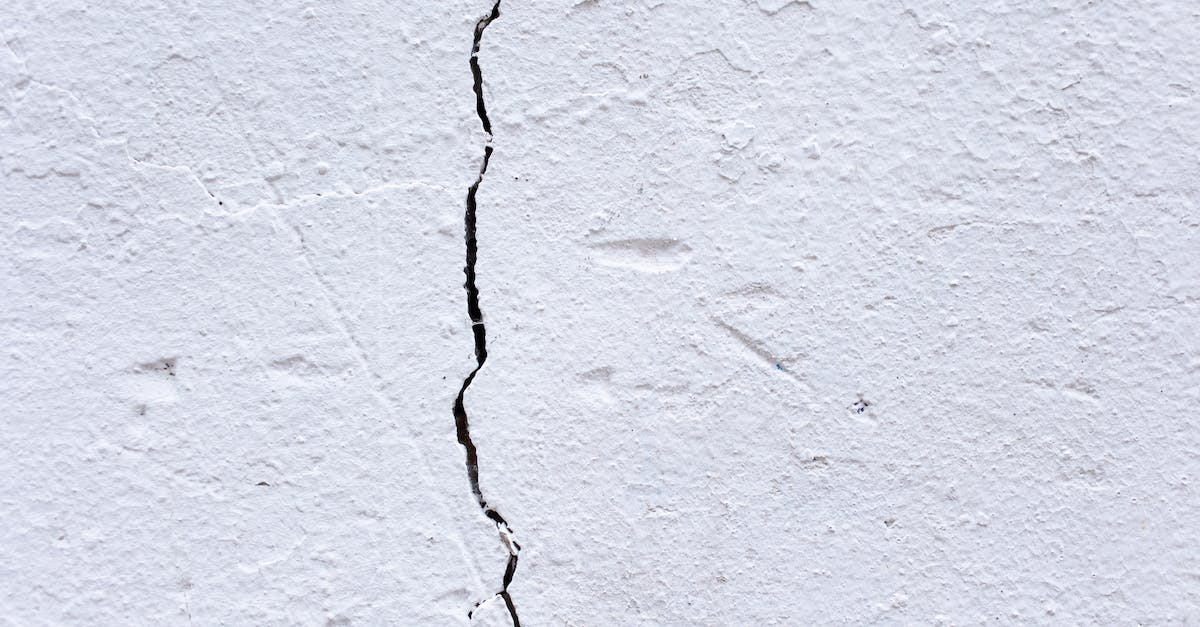 How to wind cable controllers with minimal damage - Surface of aged white wall with crack How to wind cable controllers with minimal damage - Surface of aged white wall with crack