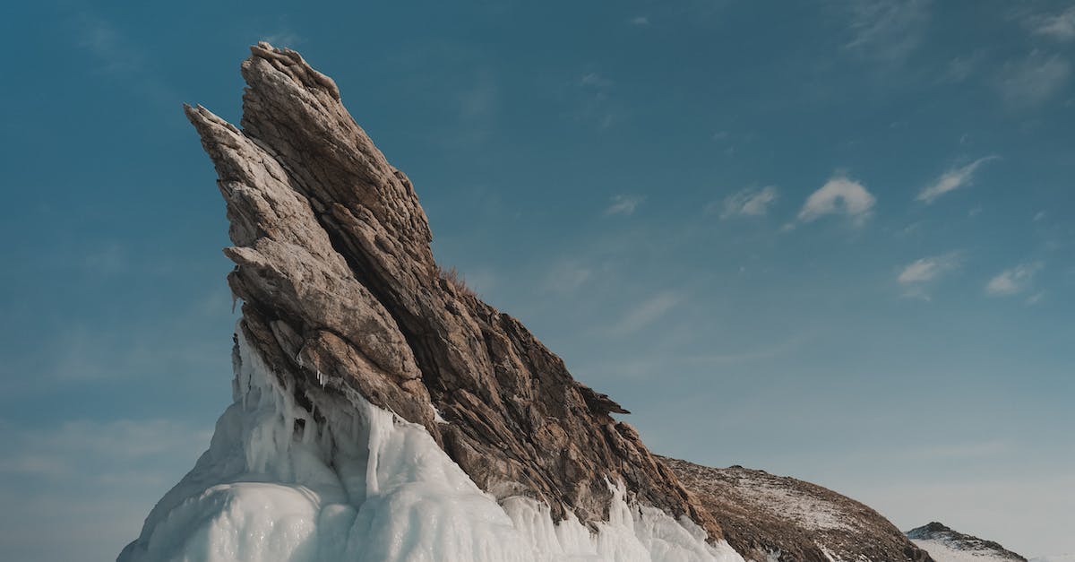 How would I make an entity stay frozen on the spot, mid air (no AI)? - Rock with ice under cloudy sky in wintertime How would I make an entity stay frozen on the spot, mid air (no AI)? - Rock with ice under cloudy sky in wintertime