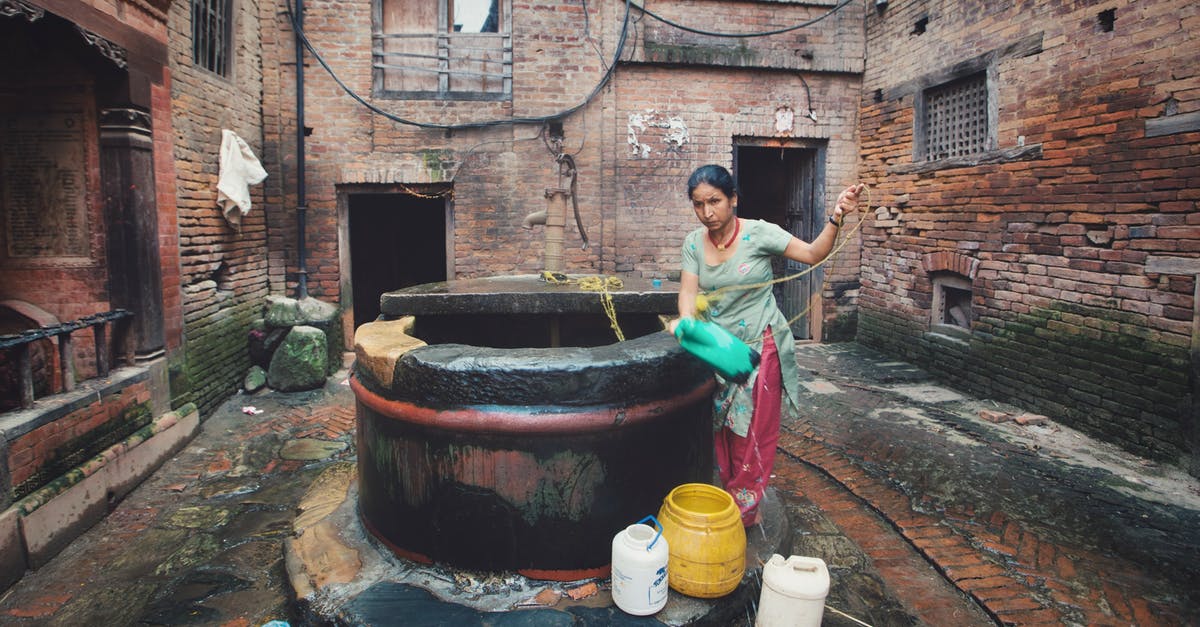 How would i use /fill to fill an area with downward-facing dispensers filled with a bucket of lava? - Ethnic woman pouring water in bucket How would i use /fill to fill an area with downward-facing dispensers filled with a bucket of lava? - Ethnic woman pouring water in bucket
