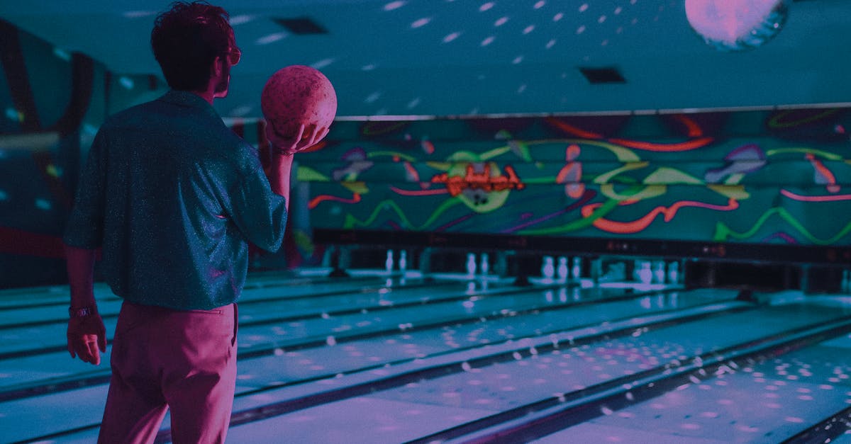 How would you tellraw a player on low health? - Unrecognizable man standing near bowling lane How would you tellraw a player on low health? - Unrecognizable man standing near bowling lane