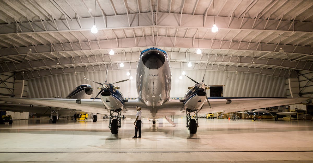 I am a Bomber Pilot, how do I master my Aircraft? - Gray Plane Inside Hangar
