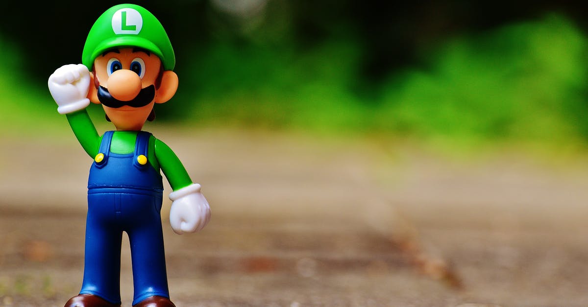 I am playing GBA version of Super Mario Advance 2: Super Mario World. How to get normal koopas back? - Shallow Focus Photography of Luigi Plastic Figure