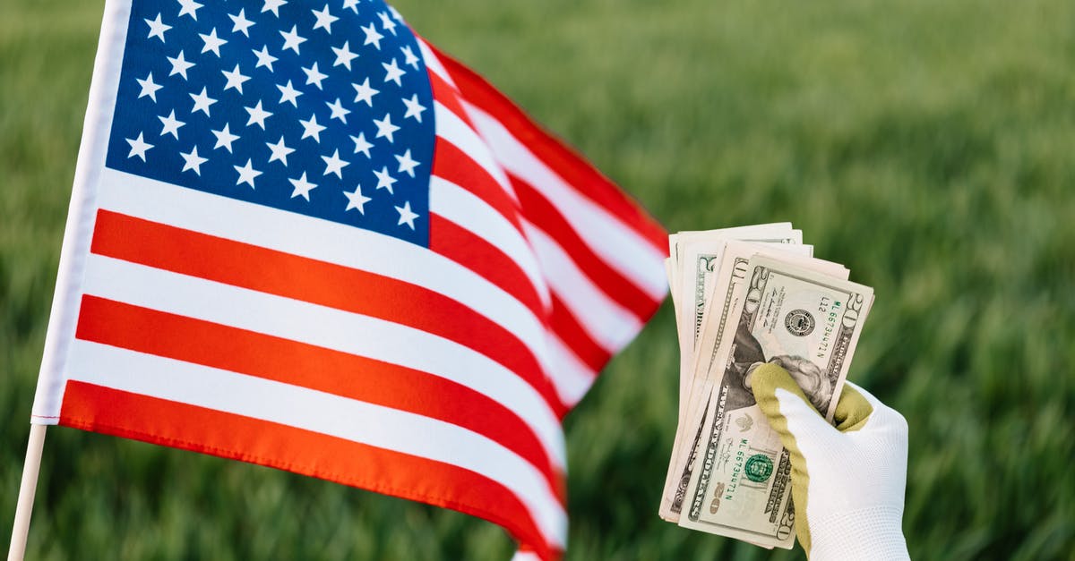 I become personal union overlord of stronger country - what to do? - American flag and crop unrecognizable person with pile of dollars I become personal union overlord of stronger country - what to do? - American flag and crop unrecognizable person with pile of dollars