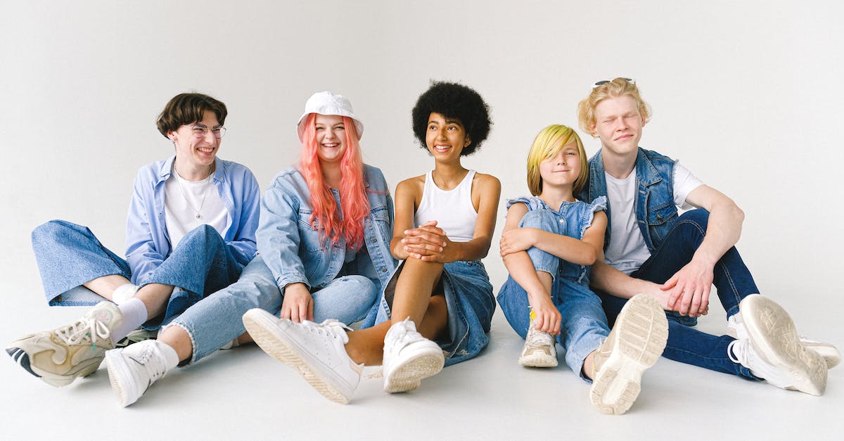 I bought DLC for Destiny and can't access it on a teen account - Delighted multiethnic group of models in modern denim clothes